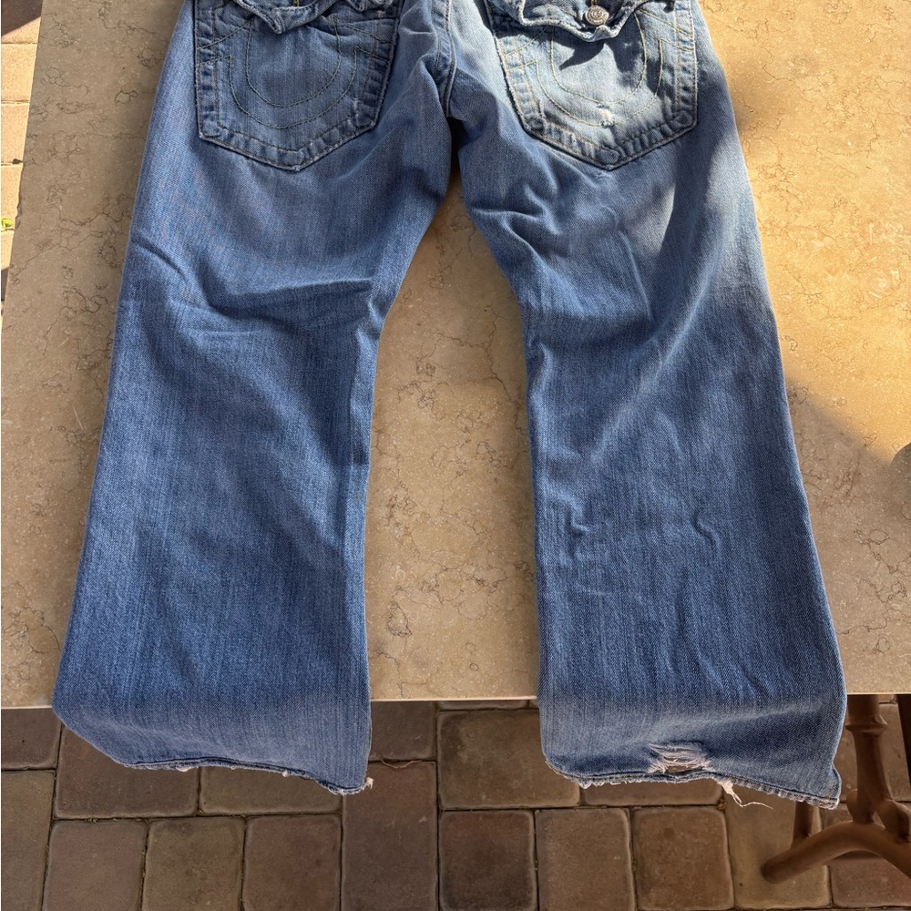 light wash distressed true religion Denim Jeans
